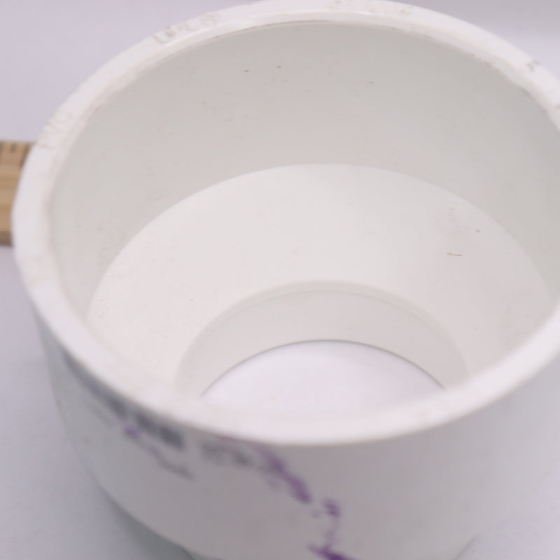 Charlotte DWV Coupling Sch. 40 PVC White 2" x 3" - HAS A PURPLE PAINT STAIN